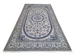 Stunning Hand-knotted Nain Carpet 306 x 194 cm