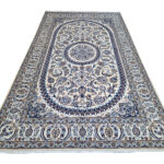 Stunning Hand-knotted Nain Carpet 306 x 194 cm