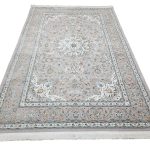 Persian Nain beige machine made carpet 300x200cm featuring an ivory floral medallion and traditional grey and green borders