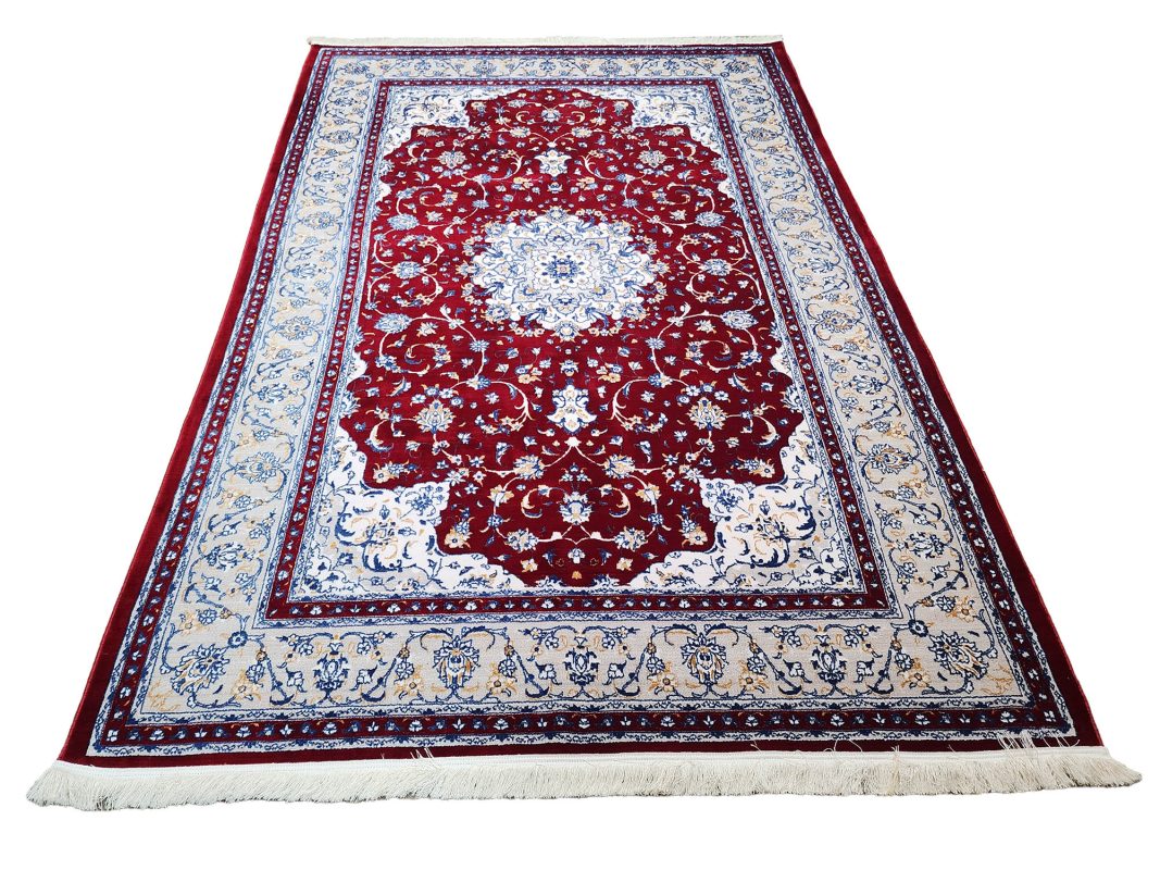 Persian Nain red machine made carpet 300x200cm featuring an ivory floral medallion and traditional cream and blue borders