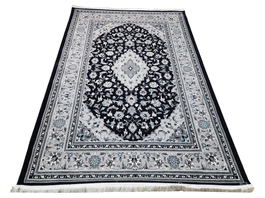 Persian Kashan navy blue machine made carpet 300x200cm featuring a silver-grey floral medallion and traditional ivory borders