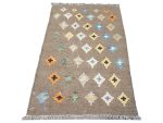 Afghan handmade reversible wool Kilim rug approximately 90x60cm featuring a brown background with blue, yellow, orange, green and cream geometric diamond motifs