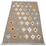 Afghan handmade reversible wool Kilim rug approximately 90x60cm featuring a brown background with blue, yellow, orange, green and cream geometric diamond motifs